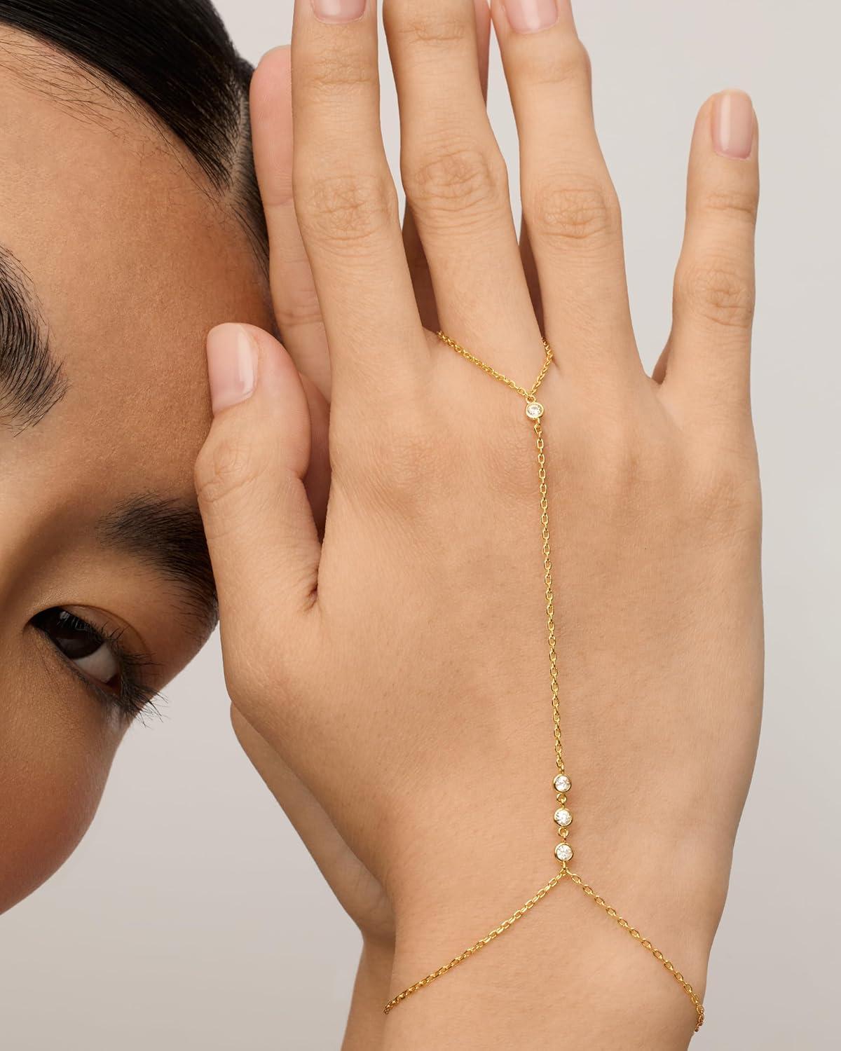 imagePAVOI 14K Gold Plated Hand Chains for Women  Adjustable Hand Chain Bracelet and Ring  Trendy Gold Handchain Bracelet Stack Summer Jewelry  Beads Pearl and Cubic Zirconia Body JewelryWhite Gold