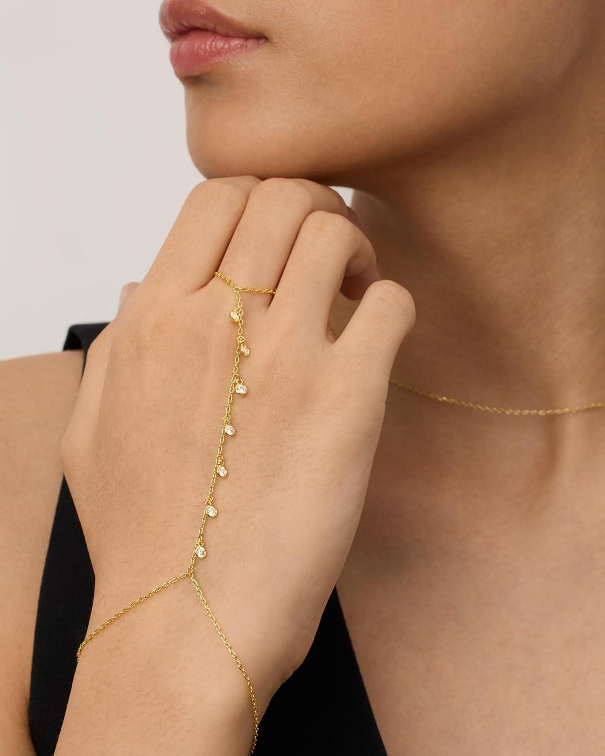imagePAVOI 14K Gold Plated Hand Chains for Women  Adjustable Hand Chain Bracelet and Ring  Trendy Gold Handchain Bracelet Stack Summer Jewelry  Beads Pearl and Cubic Zirconia Body JewelryWhite Gold