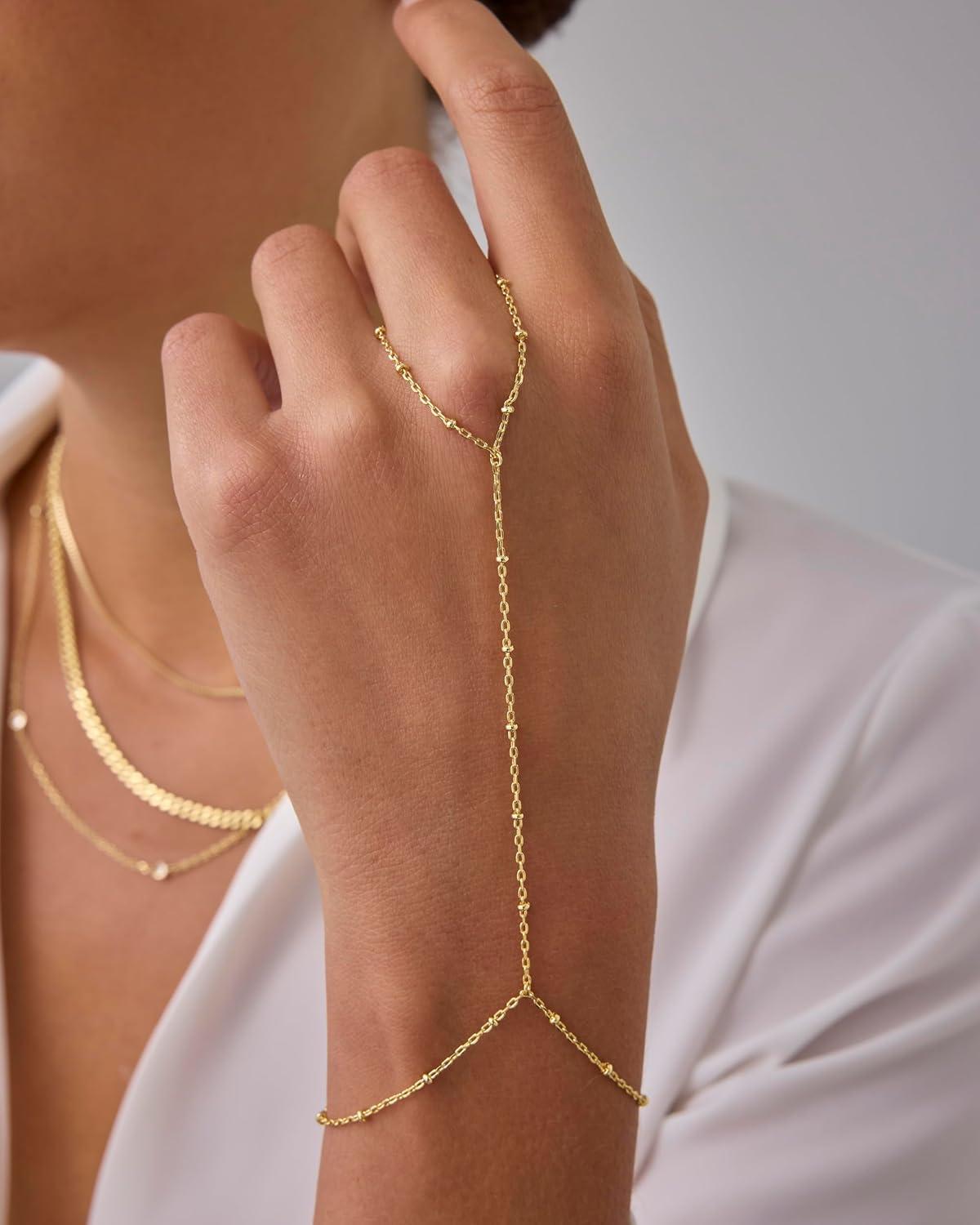 imagePAVOI 14K Gold Plated Hand Chains for Women  Adjustable Hand Chain Bracelet and Ring  Trendy Gold Handchain Bracelet Stack Summer Jewelry  Beads Pearl and Cubic Zirconia Body JewelryWhite Gold