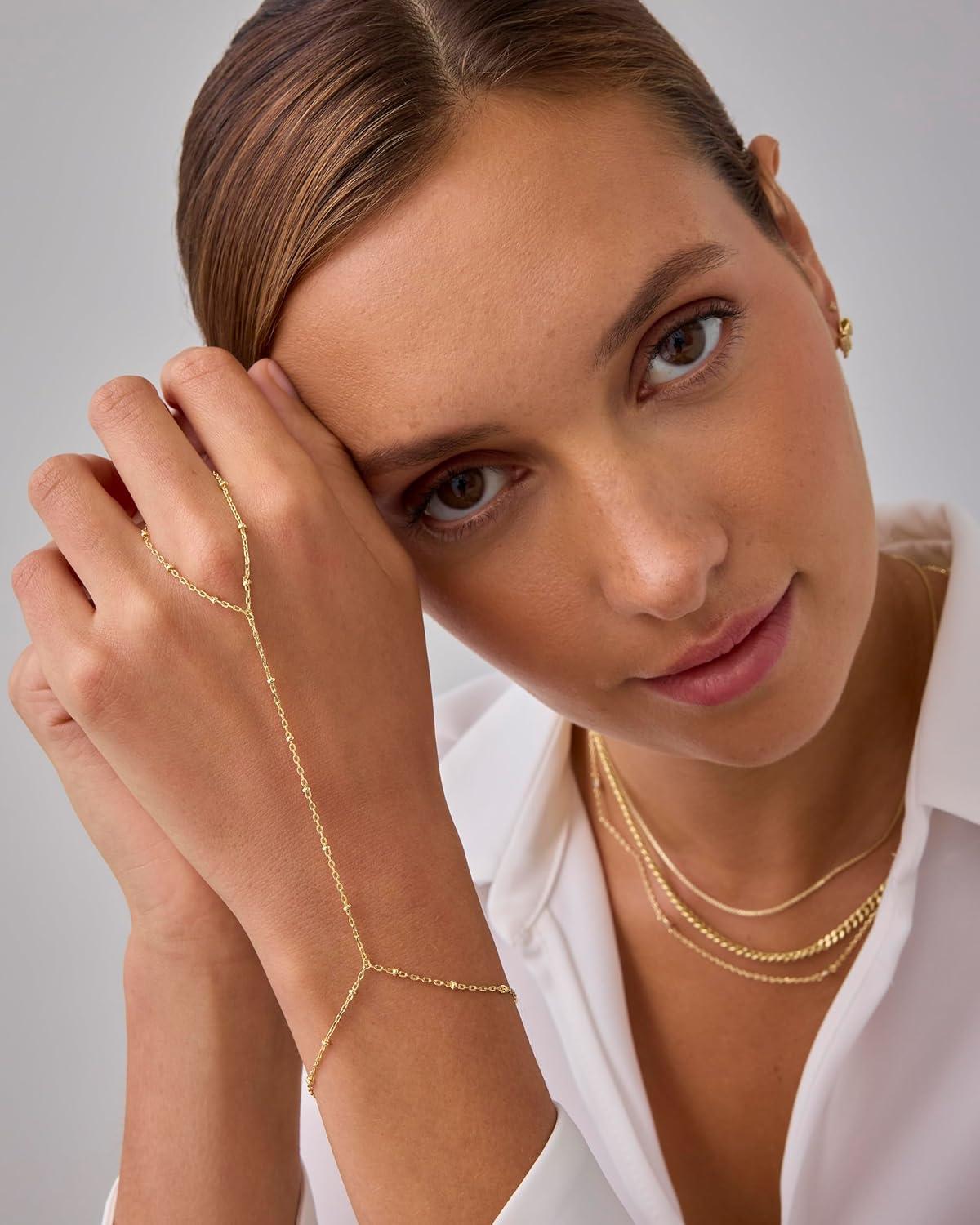 imagePAVOI 14K Gold Plated Hand Chains for Women  Adjustable Hand Chain Bracelet and Ring  Trendy Gold Handchain Bracelet Stack Summer Jewelry  Beads Pearl and Cubic Zirconia Body JewelryWhite Gold