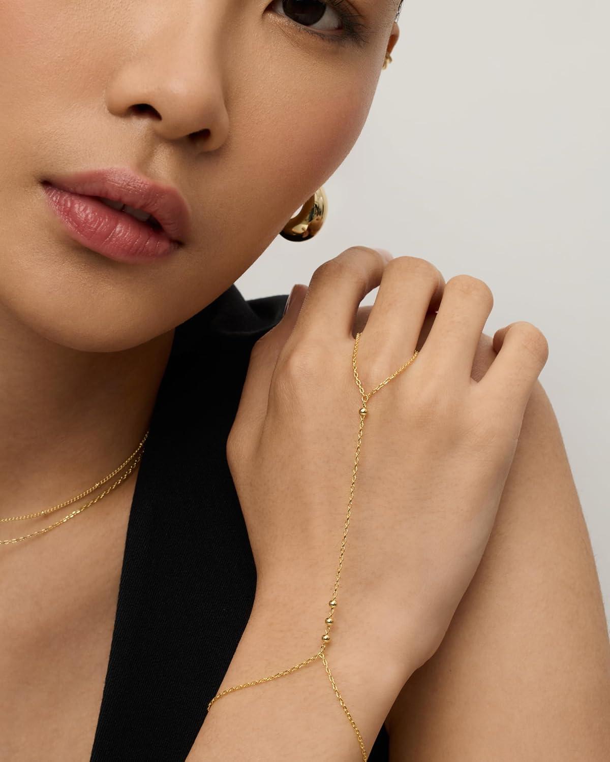 imagePAVOI 14K Gold Plated Hand Chains for Women  Adjustable Hand Chain Bracelet and Ring  Trendy Gold Handchain Bracelet Stack Summer Jewelry  Beads Pearl and Cubic Zirconia Body JewelryWhite Gold