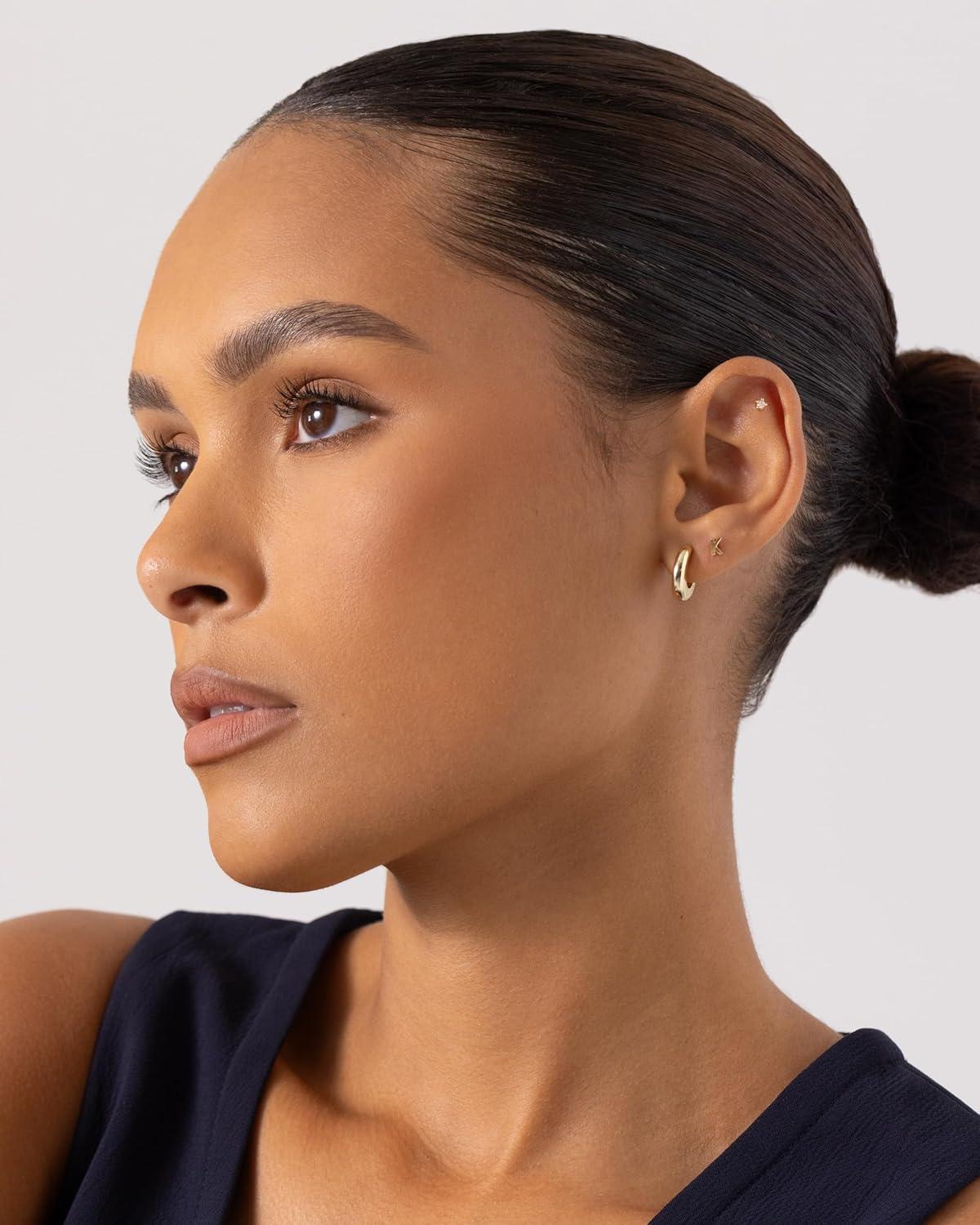 imagePAVOI 14K Gold Plated Chunky Huggies Earrings for Women  925 Sterling Silver Posts Small Gold Huggie Hoop Earrings  Ultra Thick Hoops Trendy JewelryWhite Gold