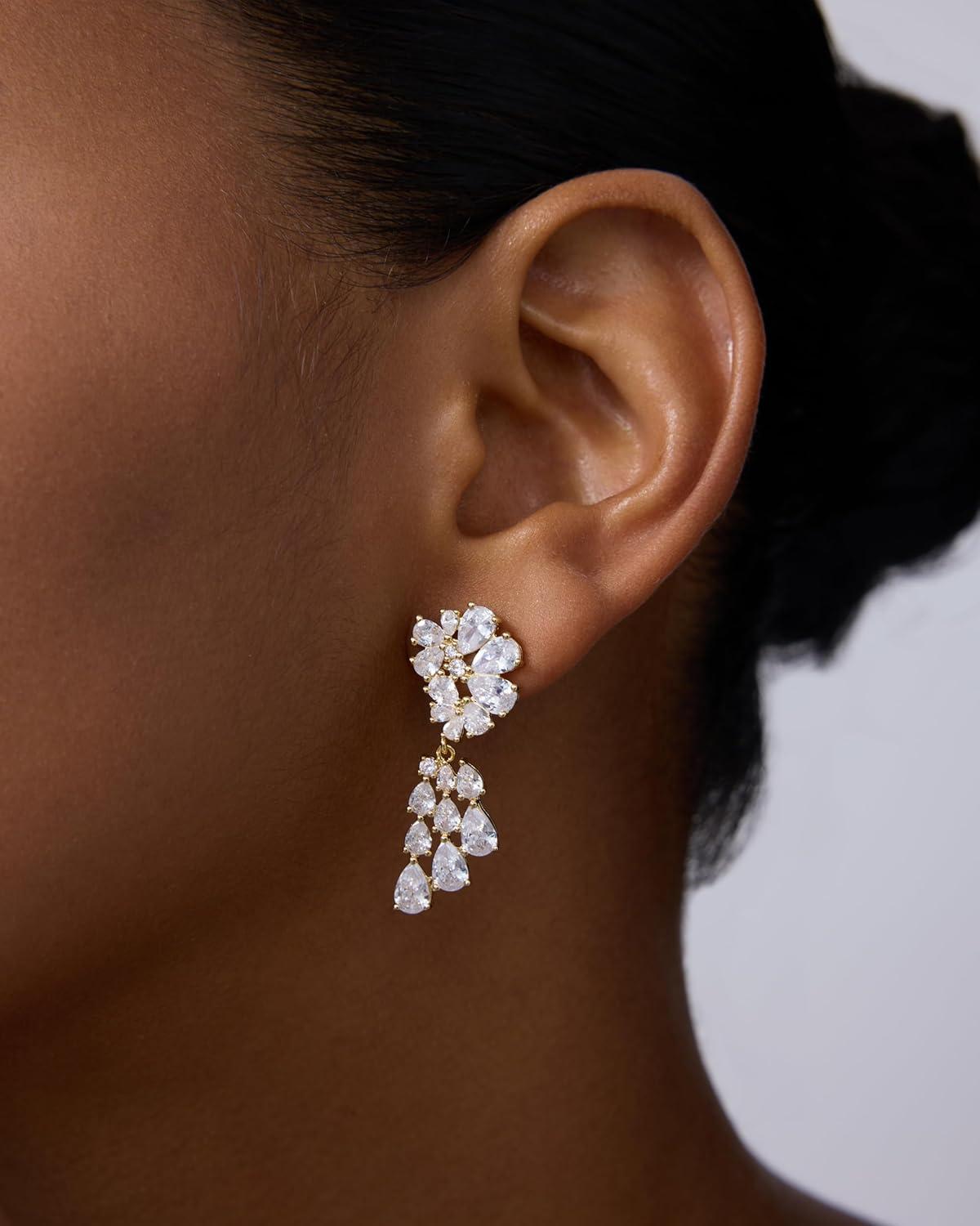 imagePAVOI 14K Gold Plated Crystal Chandelier Earrings for Women  925 Sterling Silver Posts Statement Cubic Zirconia Drop Dangle Earrings for Brides  Crystal Cluster Long Dangle Wedding JewelryYellow Gold