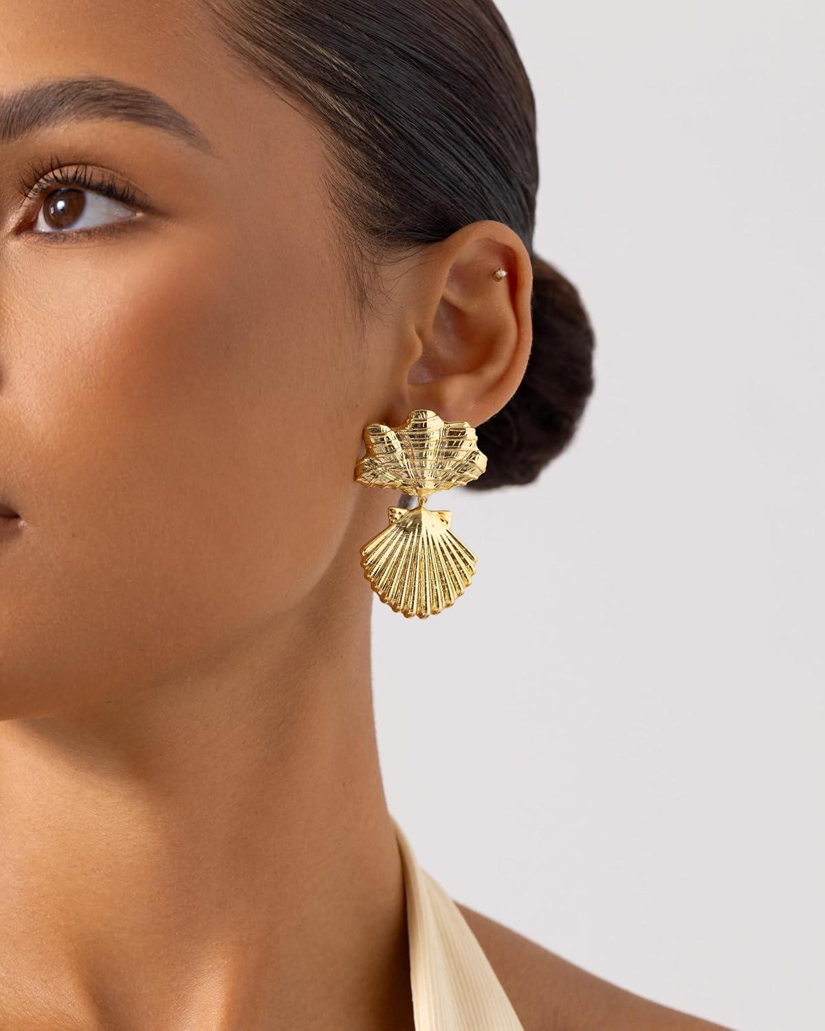 imagePAVOI 14K Gold Plated Dangle Sea Shell Earrings for Women  Statement Seashell Drop Dangle Earrings  Trendy Coastal Summer Beach JewelryYellow Gold